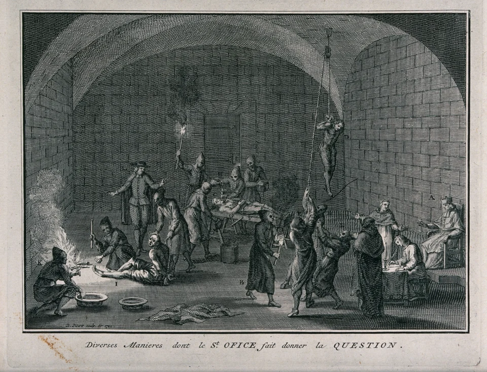 A torture chamber of the Spanish Inquisition with suspects.