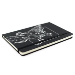 Isometric photo of Libreta Negra with Pegasus design of the Palace of Fine Arts.